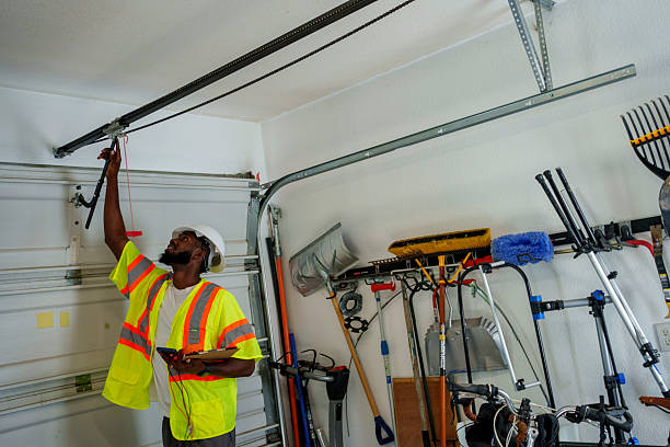Professional Garage Door Panel Replacement technician working in Foley, MN